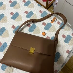 Elegant Brown Handbag with Gold Accent